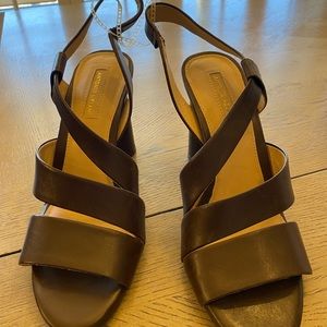 New Strapped Brown three and half inch high heels.